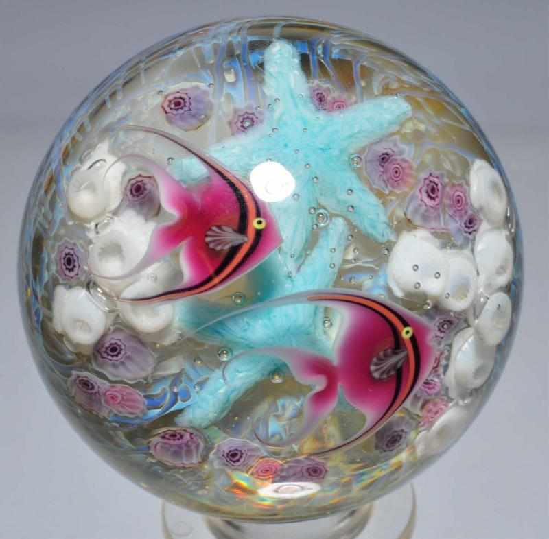 Appraisal: David Salazar Marble Description Fish in sea with beautiful detail