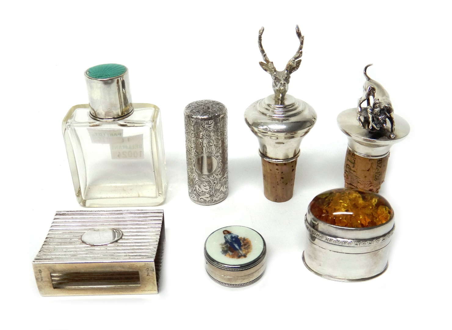 Appraisal: A silver topped and green enamelled glass scent bottle a