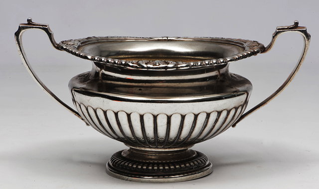 Appraisal: A GEORGE V SILVER SUGAR VASE with gadroon and shell