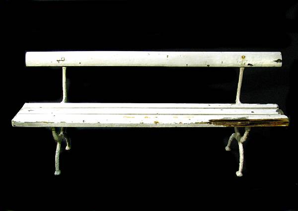 Appraisal: A painted cast iron and wood long bench worming height