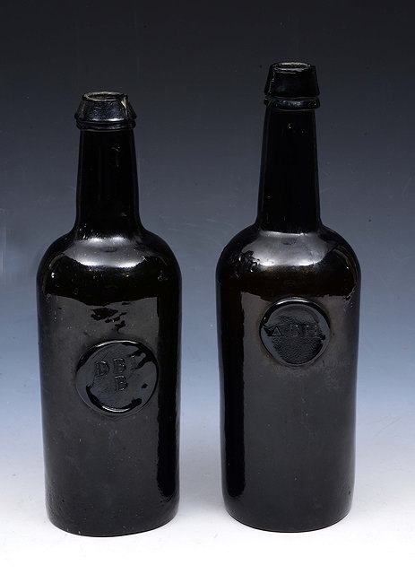 Appraisal: TWO OLD GREEN GLASS WINE BOTTLES one with seal D