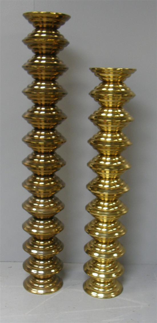 Appraisal: Stuart Devlin two matching brass floor standing candlesticks with multiple