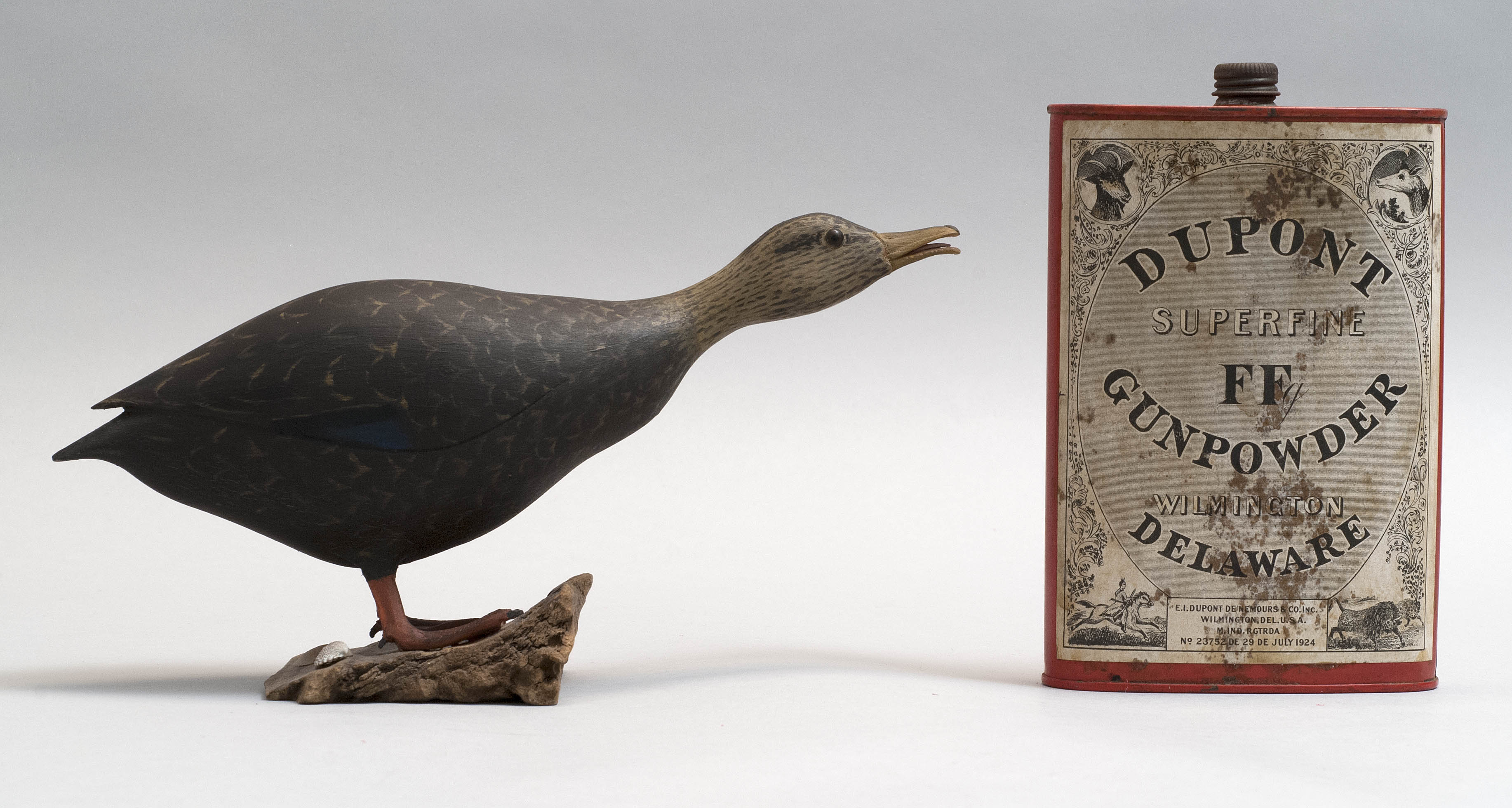 Appraisal: MINIATURE CARVING OF A BLACK DUCK By John DuMont of