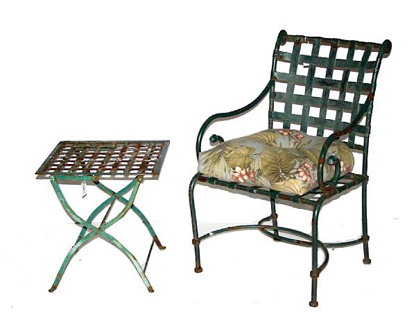 Appraisal: A pair of French Neoclassical style painted iron garden chairs