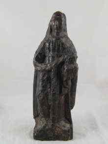 Appraisal: A medieval carved wooden figure of the Madonna and Child