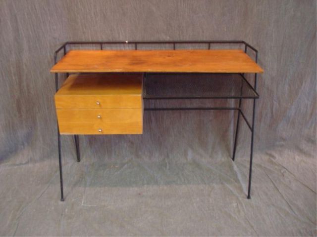 Appraisal: Mid Century wood and metal desk Some veneer losses x