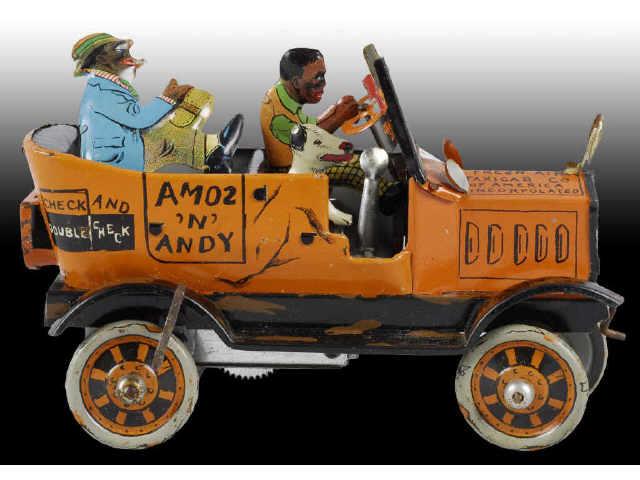 Appraisal: Tin Marx Amos N Andy Taxi Toy Description Wind-up Working