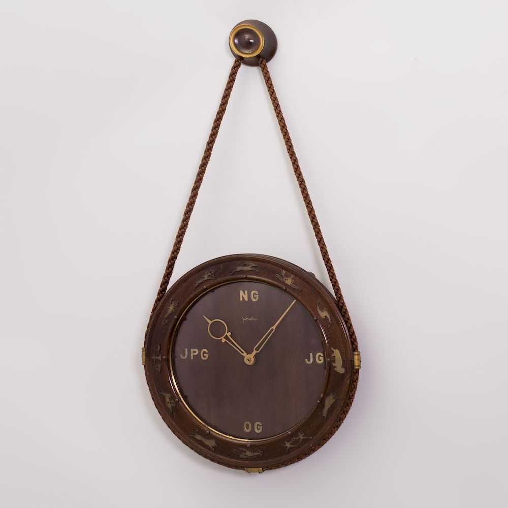 Appraisal: Modern Brass-Mounted Oak Zodiac Clock The border with signs of