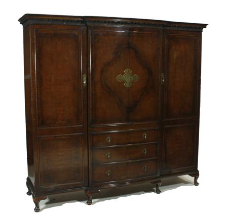 Appraisal: A burr walnut break front wardrobe By Waring and Gillows