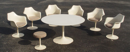 Appraisal: KNOLL SAARINEN TULIP TABLE AND SIX CHAIRS White laminate top