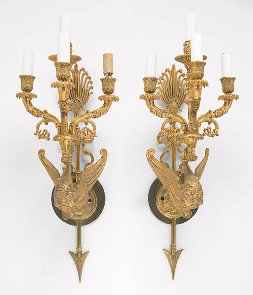 Appraisal: A pair of Empire style gilt bronze four light bras