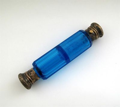 Appraisal: A Victorian silvergilt mounted double ended scent with a ten-sided