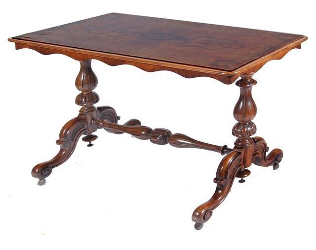 Appraisal: A VICTORIAN FIGURED WALNUT RECTANGULAR CENTRE TABLE with moulded edge