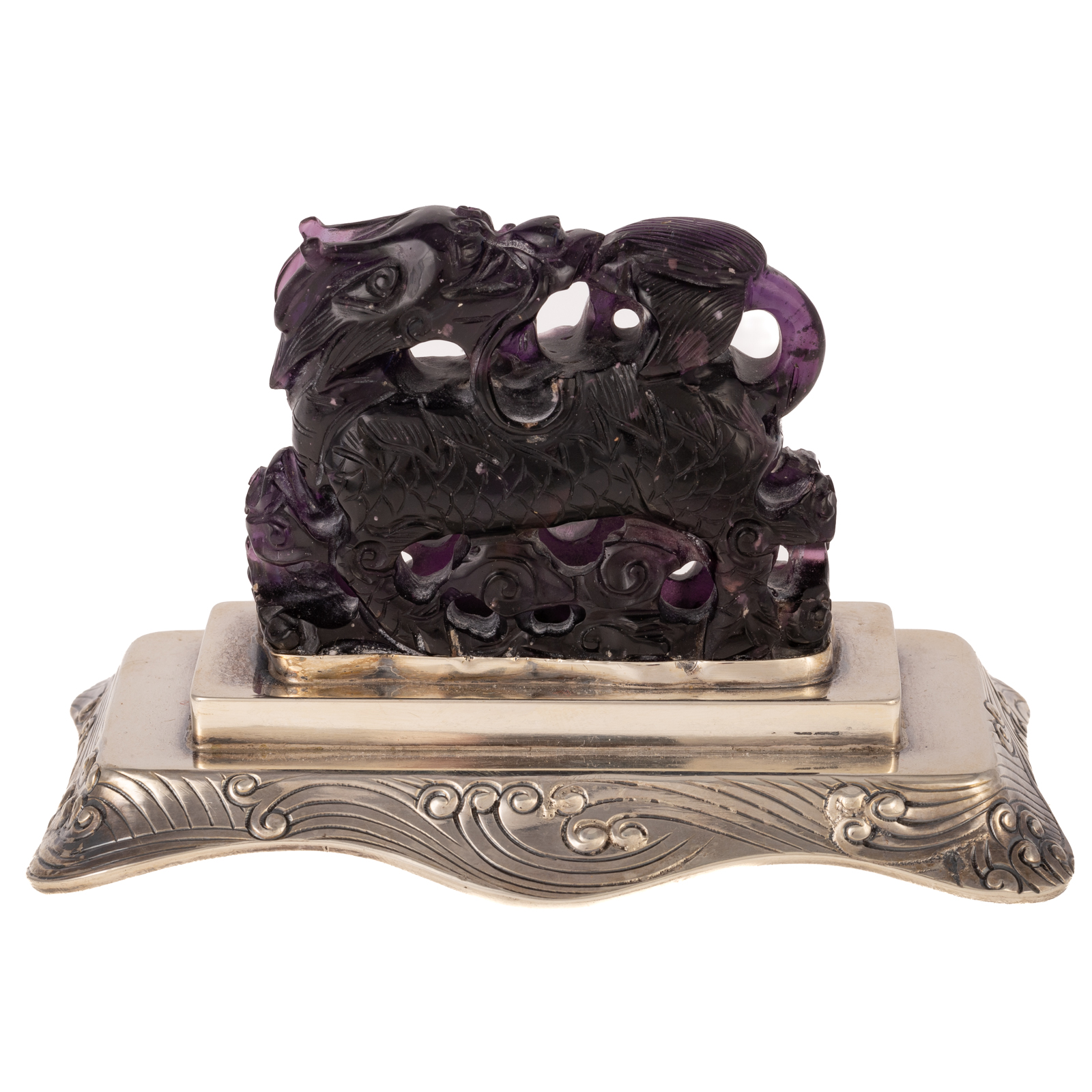 Appraisal: CHINESE CARVED AMETHYST DRAGON ON SILVER BASE Carved amethyst dragon