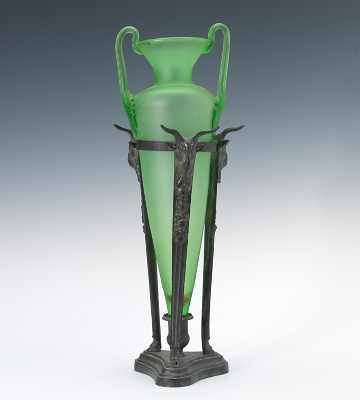 Appraisal: A Green Glass Vase in Holder Archaistic matte finish green