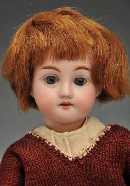 Appraisal: Bleuette Type Doll Description Bisque head child doll on fully