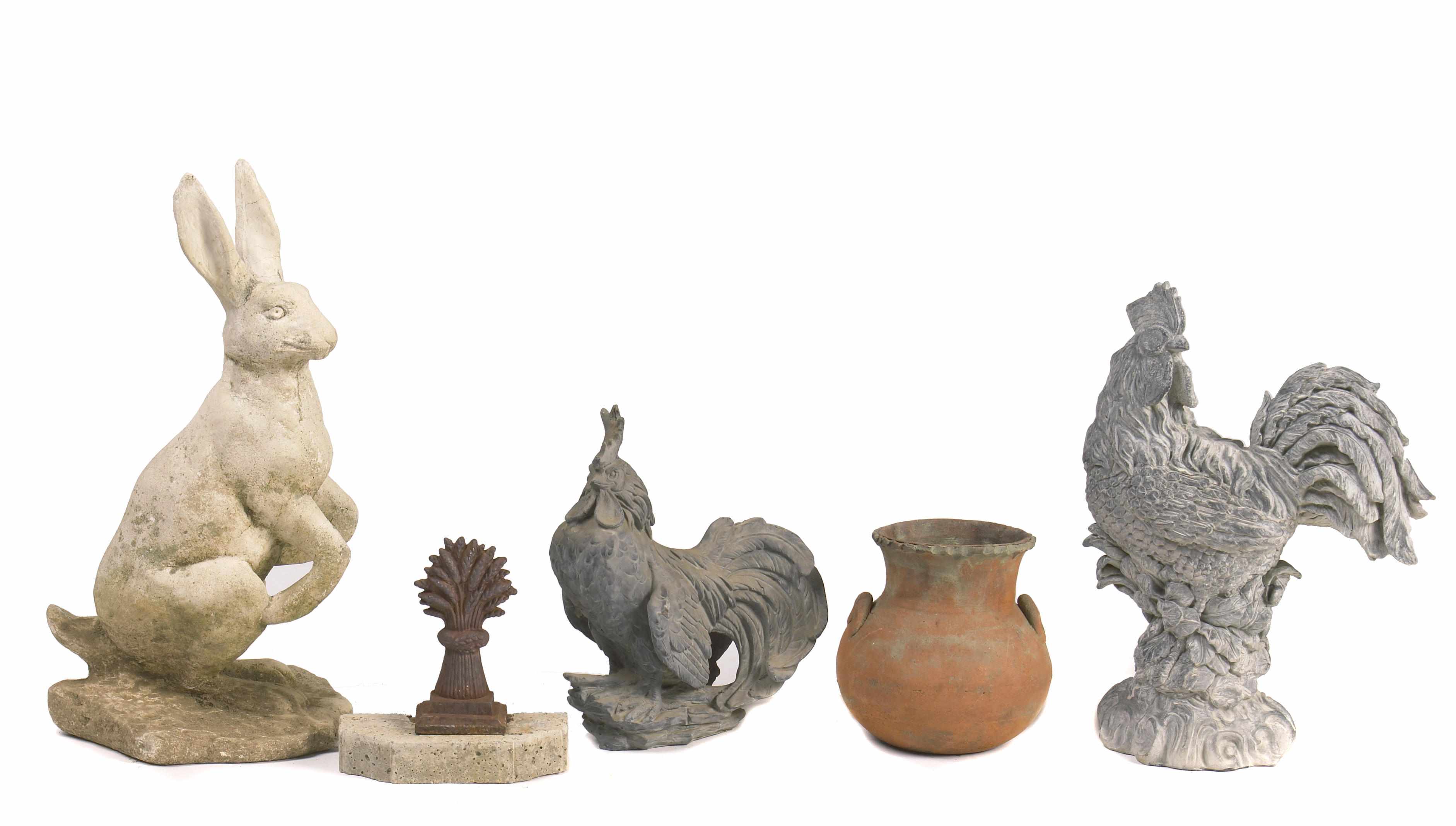 Appraisal: An assembled group of decorative garden elements Comprising figures of