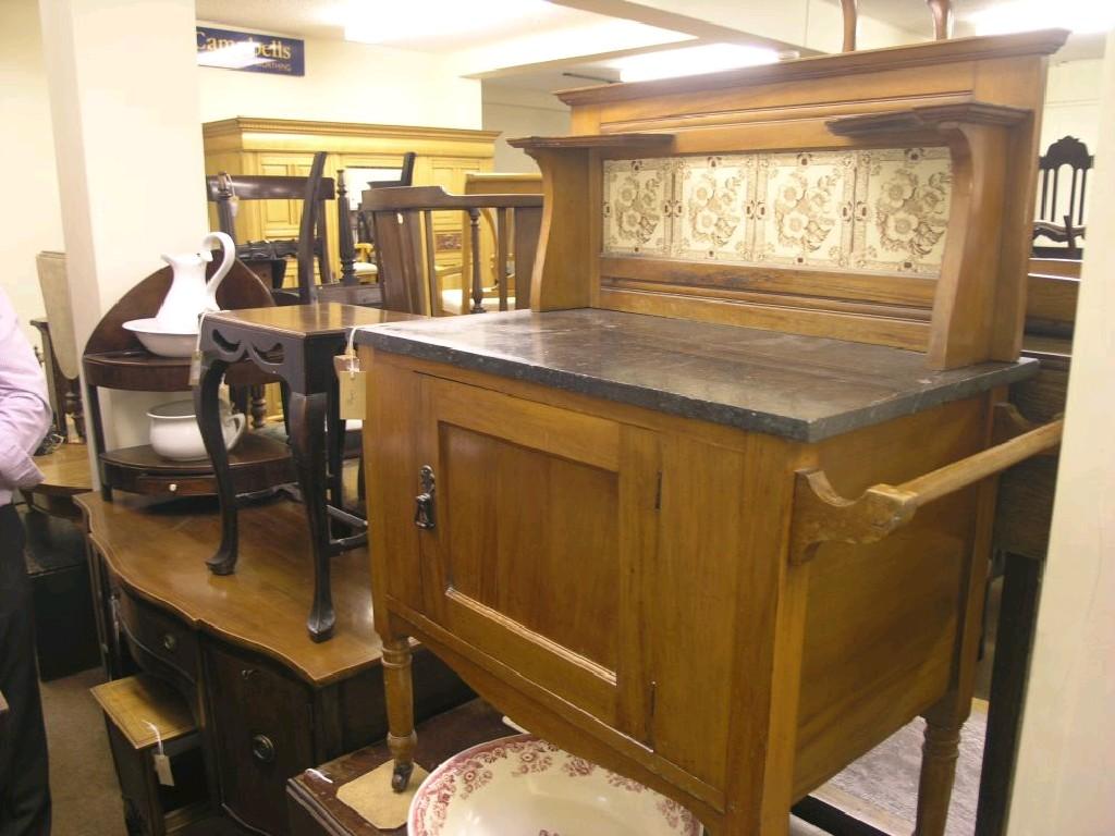 Appraisal: A Victorian satin-walnut washstand raised tiled back with overshelves marble