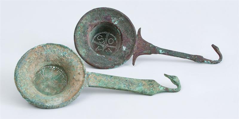 Appraisal: TWO ETRUSCAN BRONZE STRAINERS Both x in Estimate -