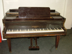 Appraisal: A mahogany cased baby grand piano by HOPKINSON LONDON upon