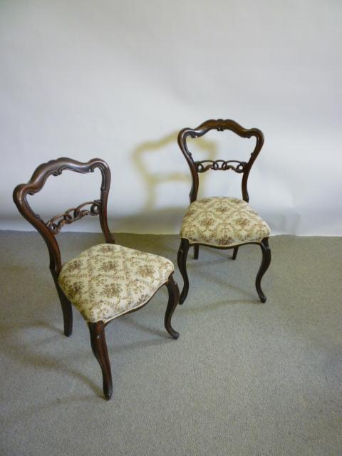 Appraisal: A SET OF SIX VICTORIAN ROSEWOOD DINING CHAIRS of open