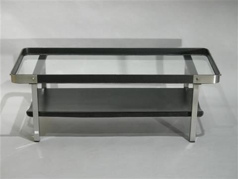 Appraisal: MODERN FAUX LEATHER COFFEE TABLE Twentieth century the rounded glass