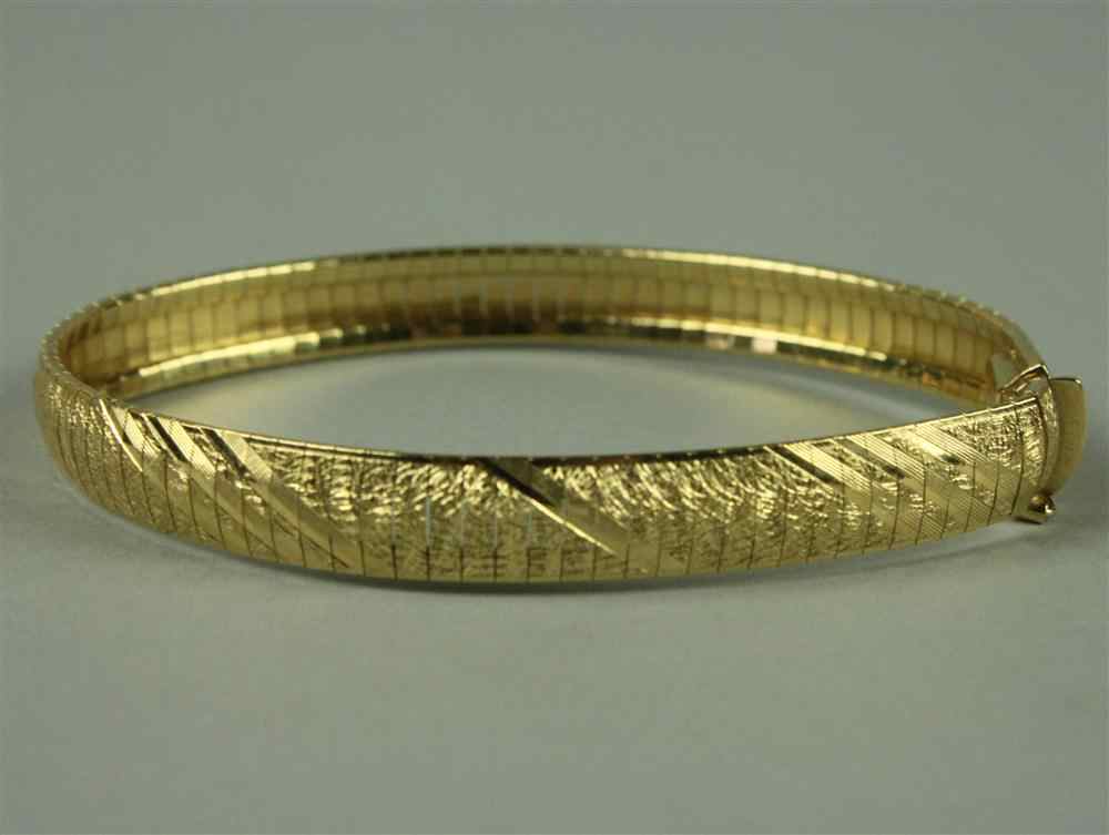 Appraisal: LADY'S ITALIAN K YELLOW GOLD FLEXIBLE BANGLE BRACELET marked RCI