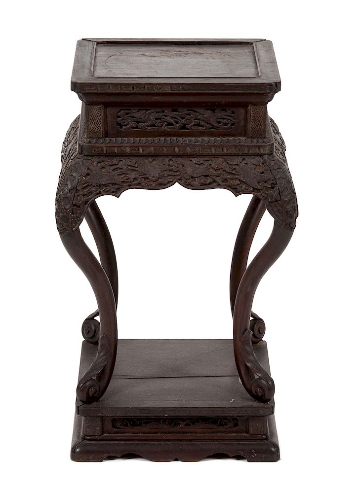 Appraisal: An Asian Carved Hardwood Pedestal Table Height x inches square