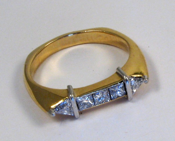 Appraisal: DIAMOND AND EIGHTEEN KARAT GOLD RING with appraisal The ring