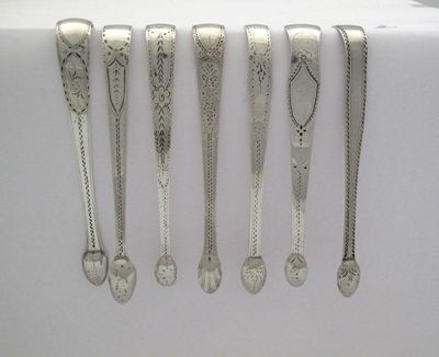 Appraisal: A collection of seven pairs of various silver sugar tongs