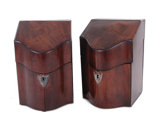 Appraisal: Pair English mahogany knife boxes th century serpentine hinged lids