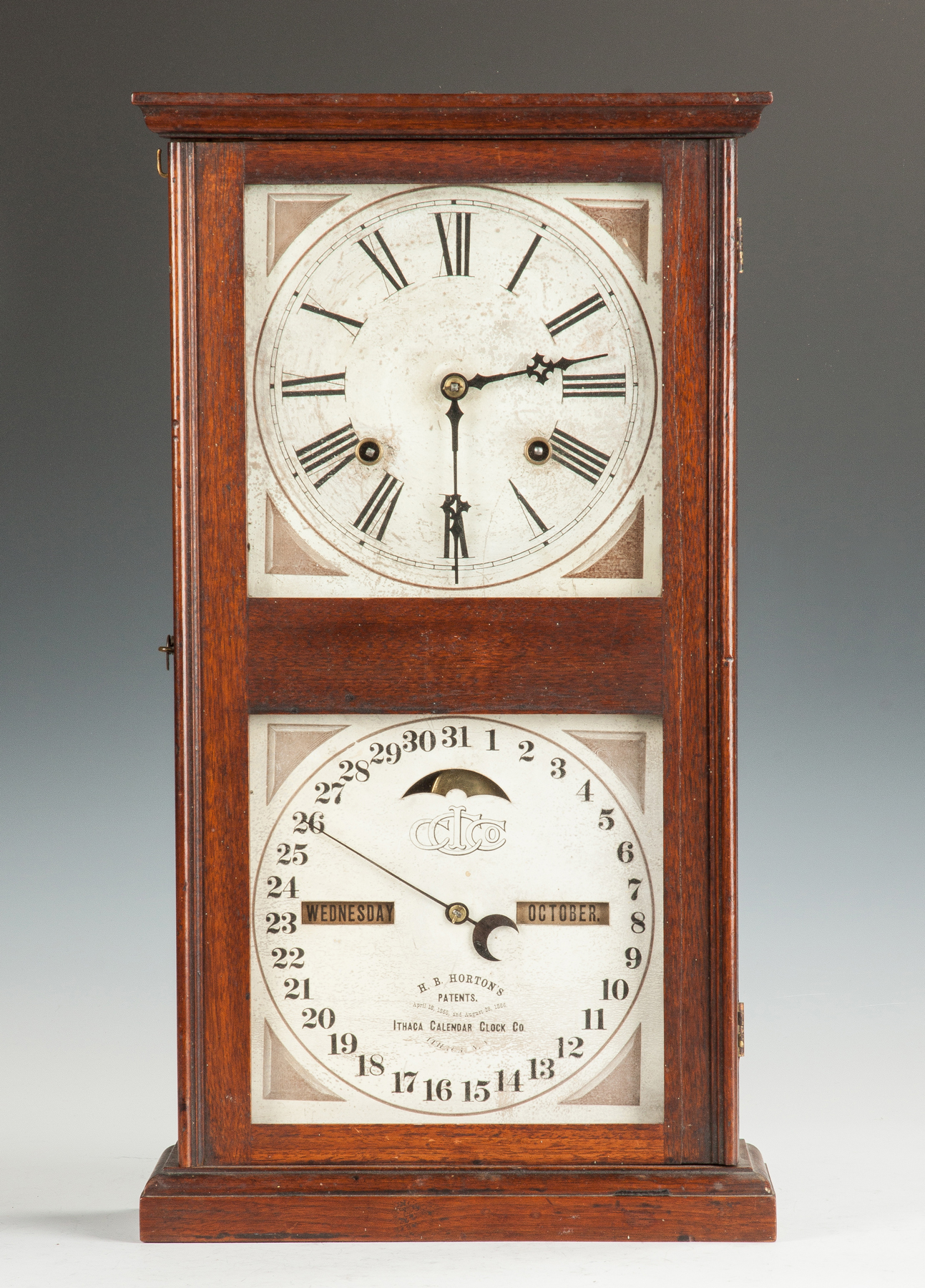 Appraisal: Ithaca Double Dial Calendar Clock - Farmer's Model Walnut case