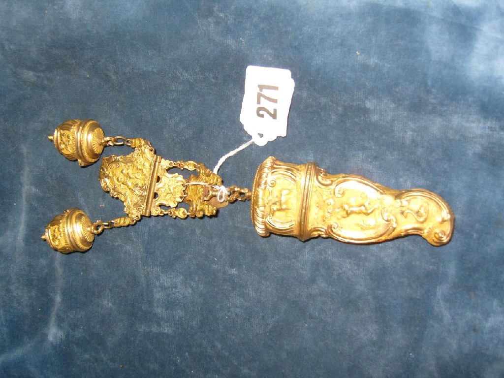 Appraisal: A th century continental gilt chatelaine with relief decoration in