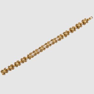 Appraisal: TIFFANY CO K Yellow Gold and Diamond Signature X Bracelet