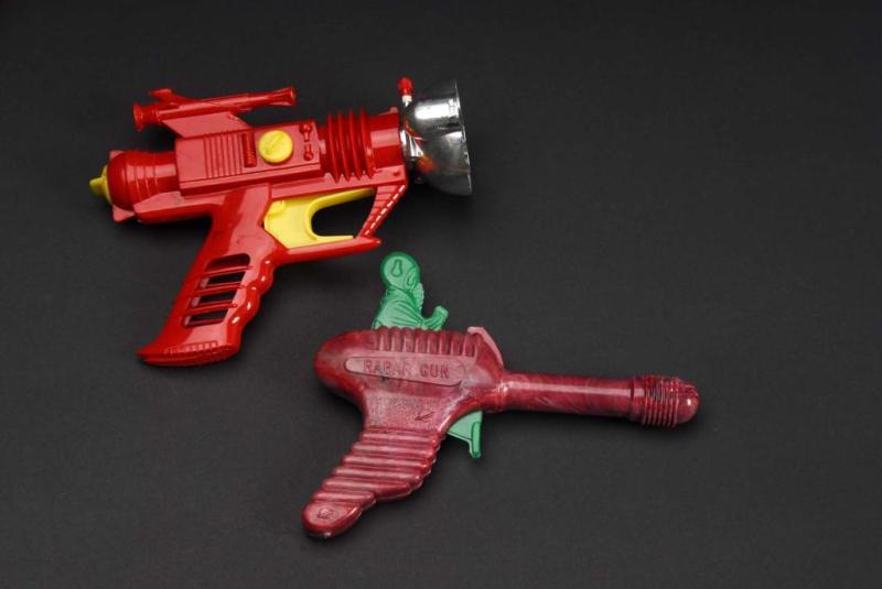 Appraisal: Lot of Plastic Space Gun Toys Description American Both are