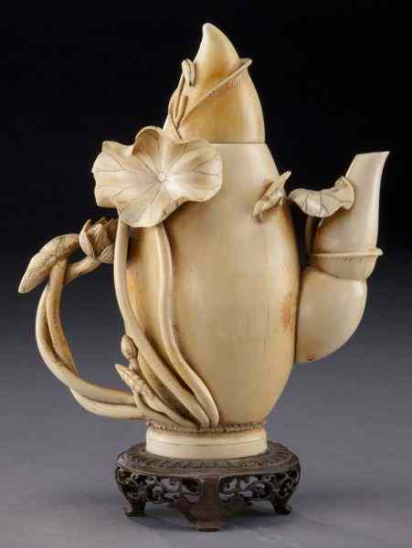 Appraisal: Chinese Qing carved ivory tea pot International buyers should note