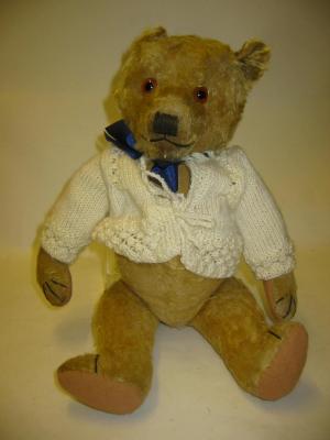 Appraisal: A Pre-War Chiltern teddy bear covered in pale gold plush