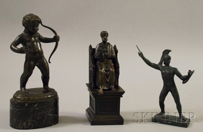 Appraisal: Three Patinated Bronze Figures putti with marble base ht to