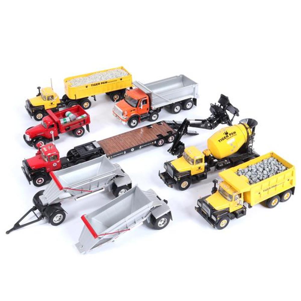 Appraisal: NINE VINTAGE TOY EXCAVATION WORK TRUCKS FIVE FIRST GEAR TIGER