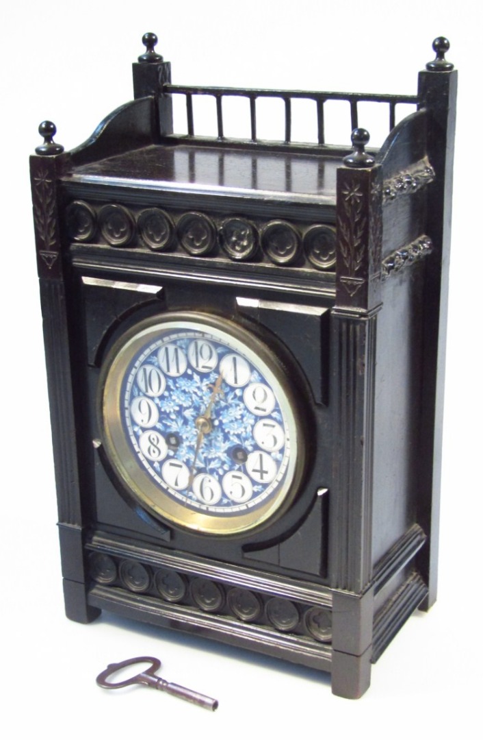 Appraisal: A late thC Aesthetic period mantel clock the part galleried