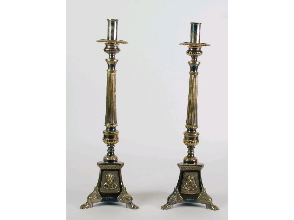 Appraisal: PAIR OF EARLY TWENTIETH CENTURY ELECTROPLATED ALTER CANDLESTICKS the turned