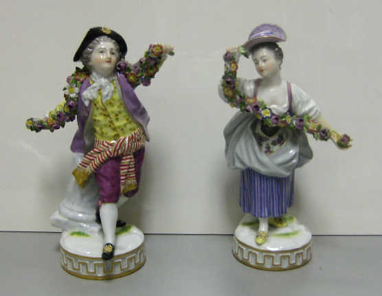 Appraisal: TWO MEISSEN PORCELAIN FIGURES After Acier design depicting standing boy