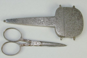 Appraisal: A th century cut steel scissor case and scissors the