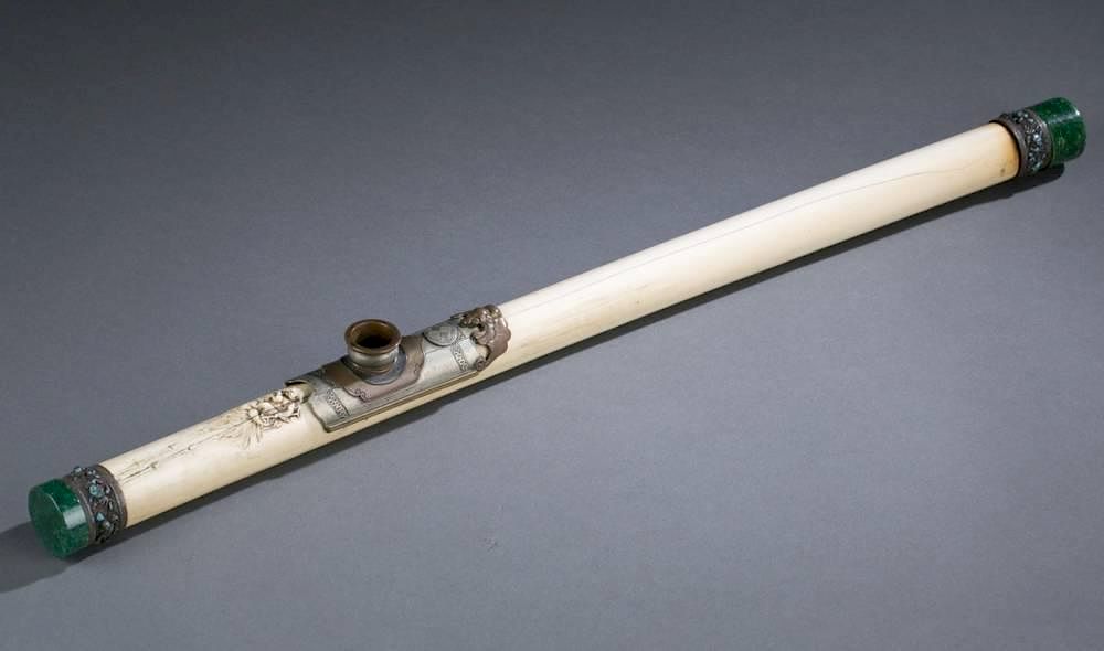 Appraisal: Chinese ivory opium pipe with faux malachite ends A Chinese