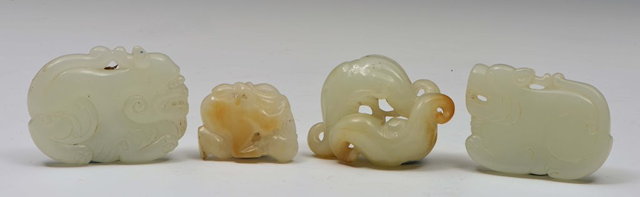 Appraisal: A CHINESE PALE CELADON JADE PENDANT carved as bats another