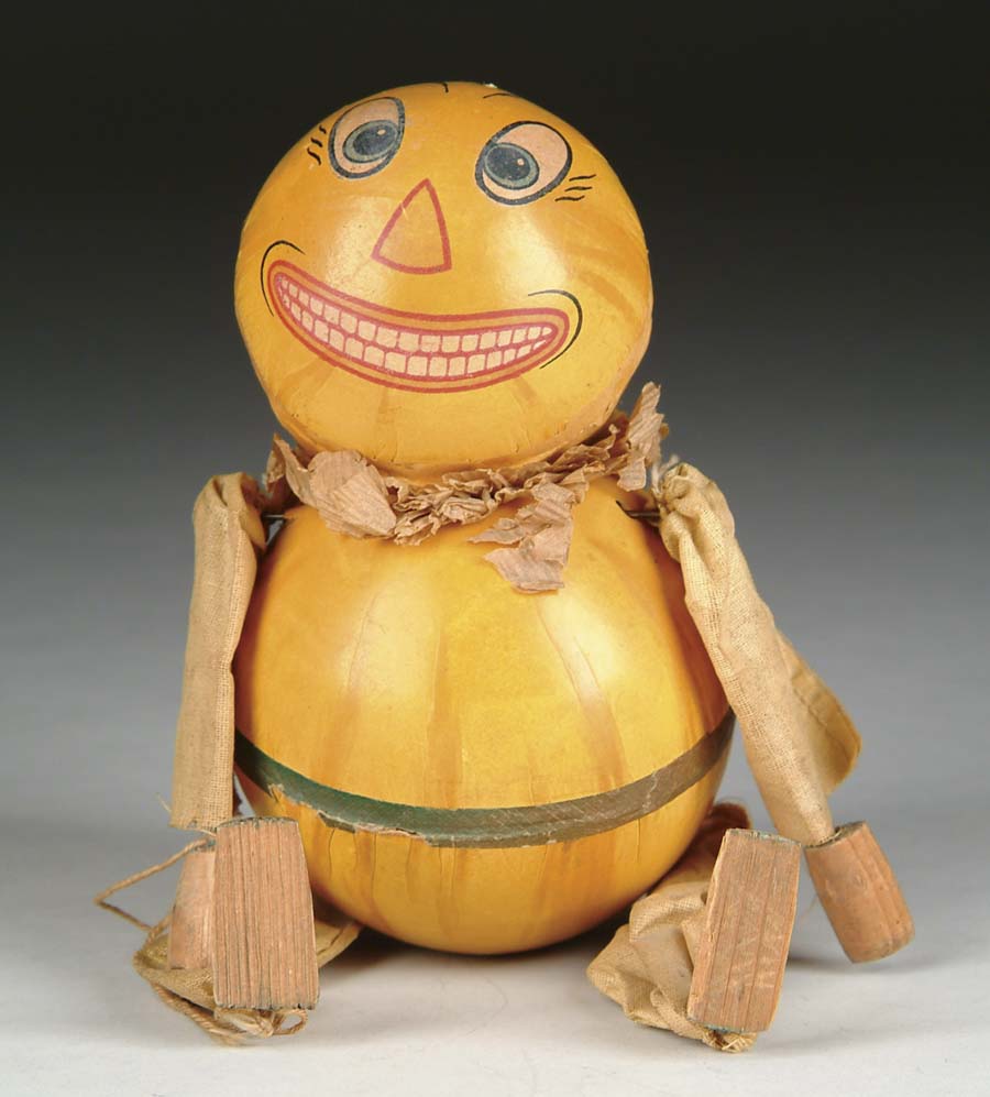 Appraisal: BULBOUS FIGURAL PUMPKIN MAN Strange dude with spherical body wire