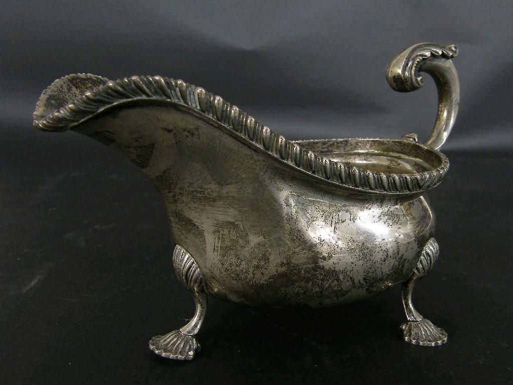 Appraisal: Late Victorian silver sauceboat with gadrooned rim and moulded acanthus