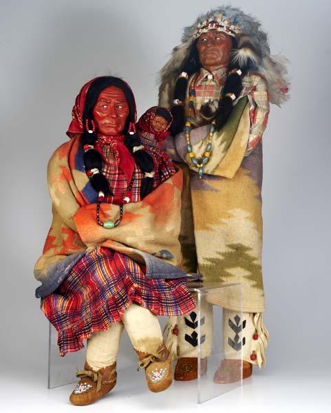 Appraisal: SKOOKUM Two Three-Footer dolls both with composite faces masks and