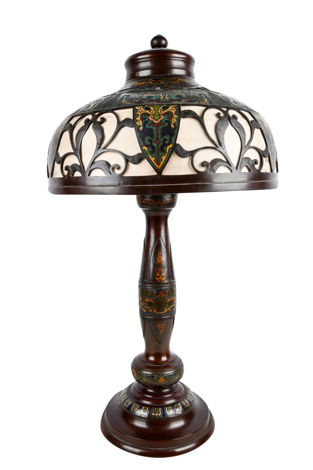 Appraisal: CHAMPLEVE ENAMEL PATINATED METAL TABLE LAMPwith silk-lined pierced shade enclosing