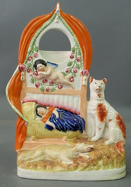 Appraisal: Staffordshire figural watch safe with an angel and two dogs